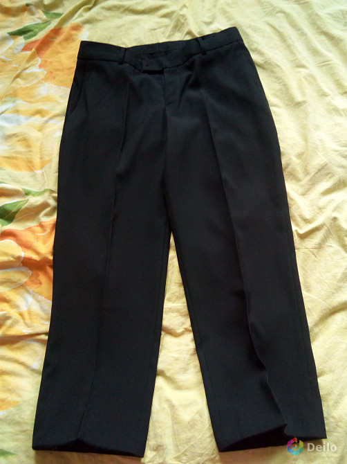Классические брюки черного цвета для мальчика