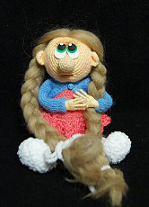 Продам связанную игрушку Девочка с косами