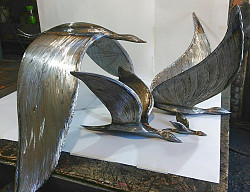 Скульптуры птиц из металла